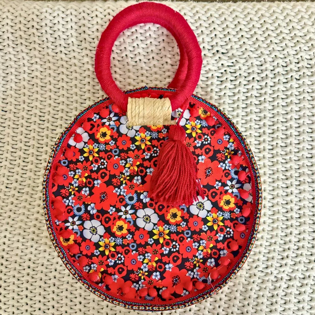 Red Poms Straw Round Bag with circular Handle